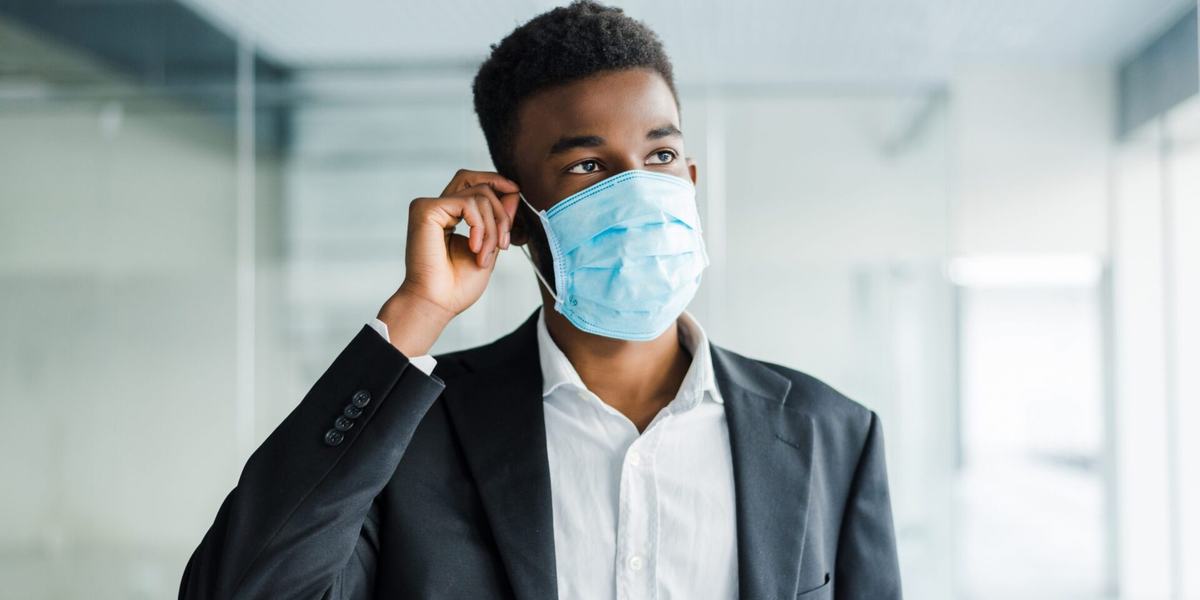 african-business-man-wearing-a-mouth-protection-to-prevent-g.jpg