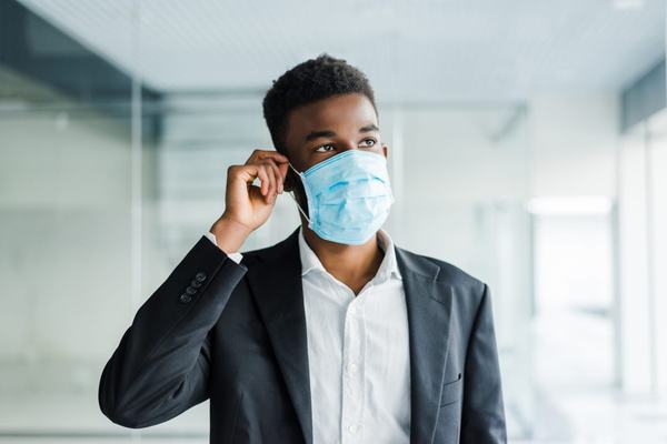 african-business-man-wearing-a-mouth-protection-to-prevent-g.jpg